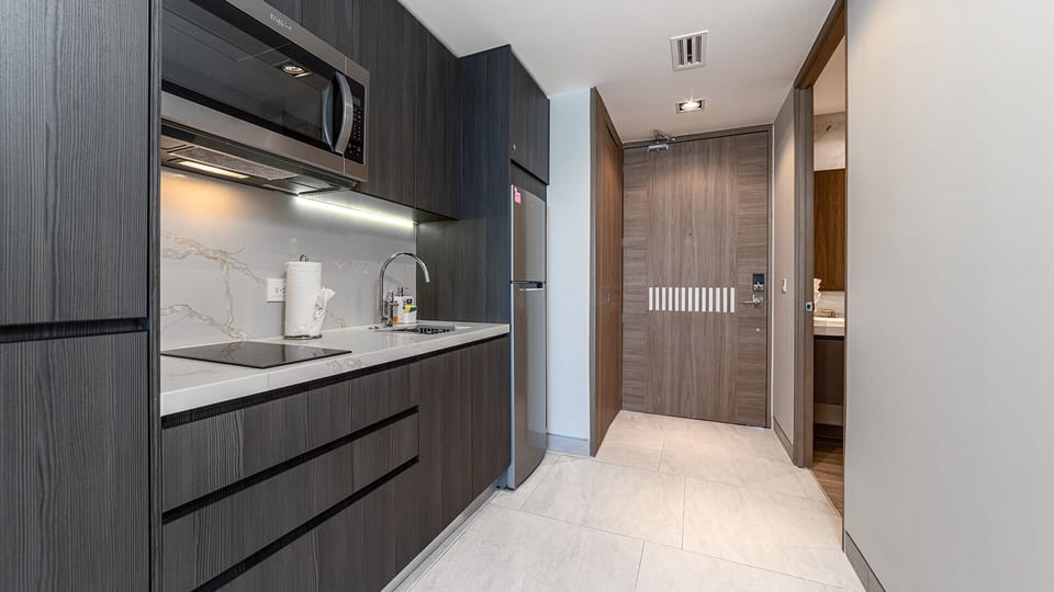 Kitchen with kitchenette and sink