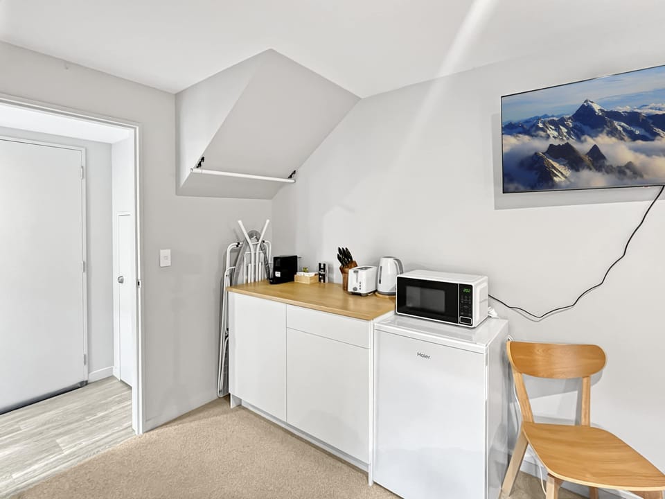 Modern kitchenette setup (please note no sink)