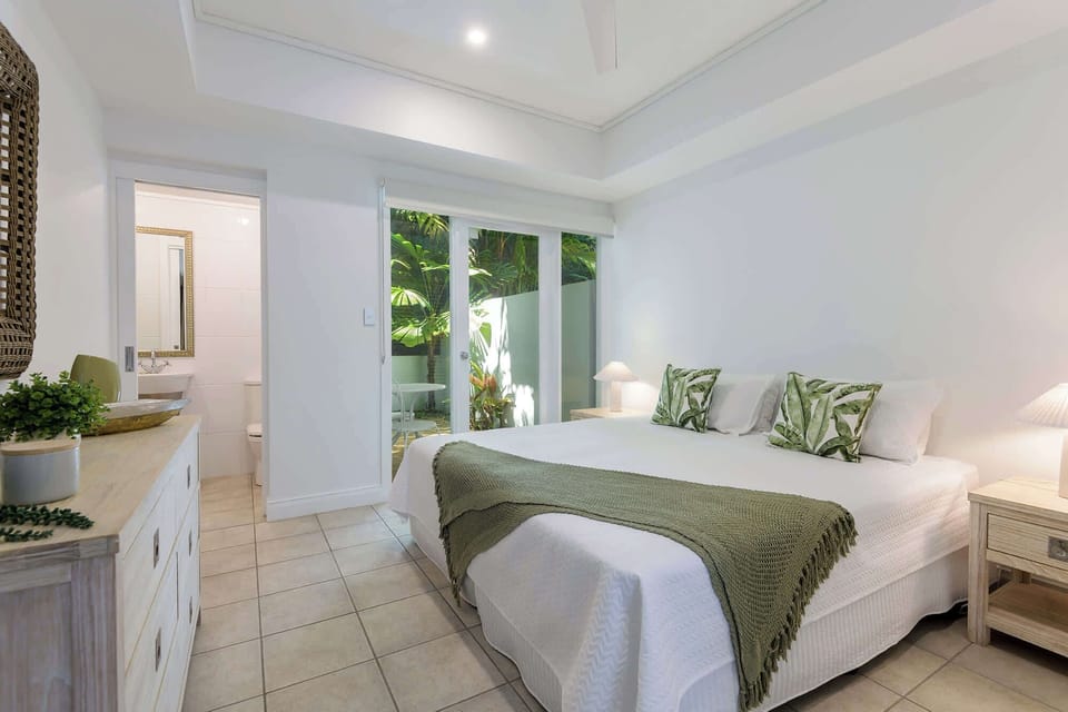 Unwind in comfort with peaceful garden views and tropical styling