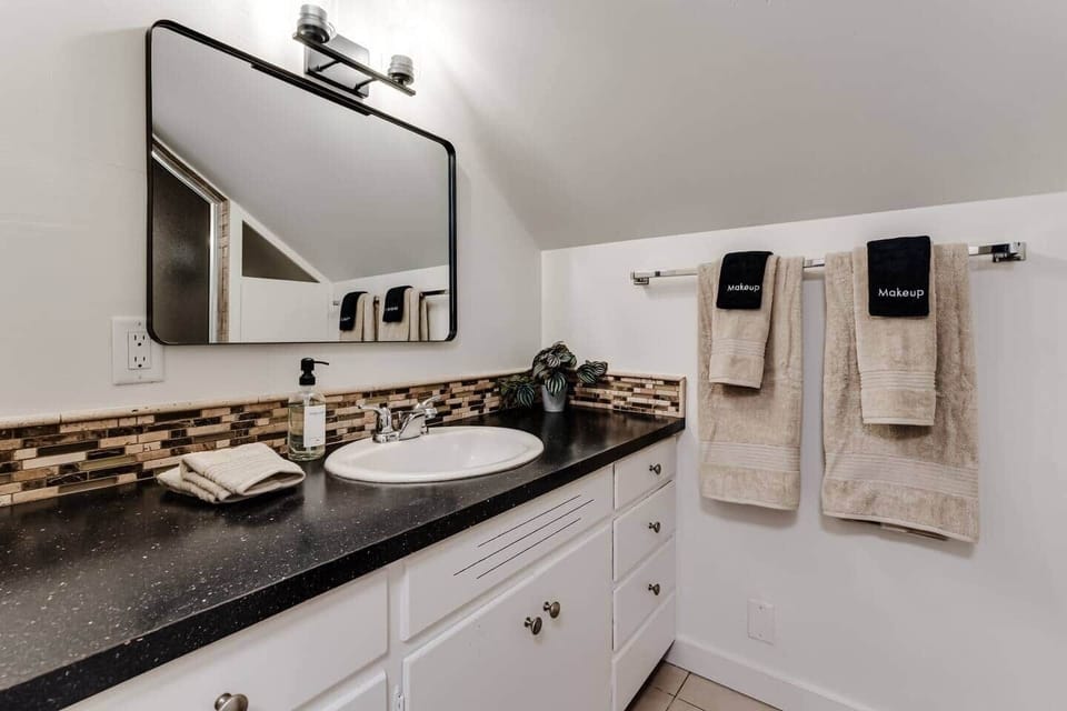 Upstairs bathroom with shower 