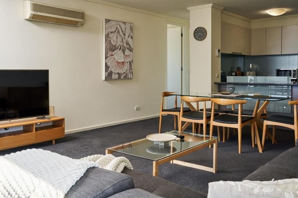 Deluxe Apartment, Balcony, City View | Living area | Smart TV