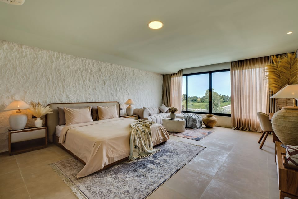 Deluxe Suite, Pool View | In-room safe, iron/ironing board, free WiFi