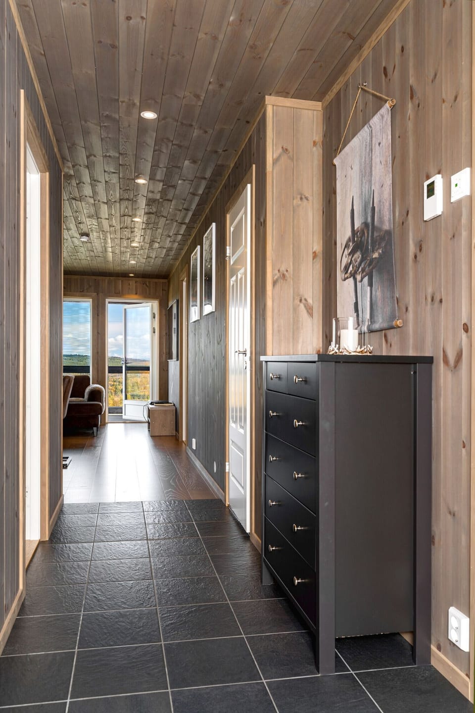 Entrance of apartment with direct view over open landscape