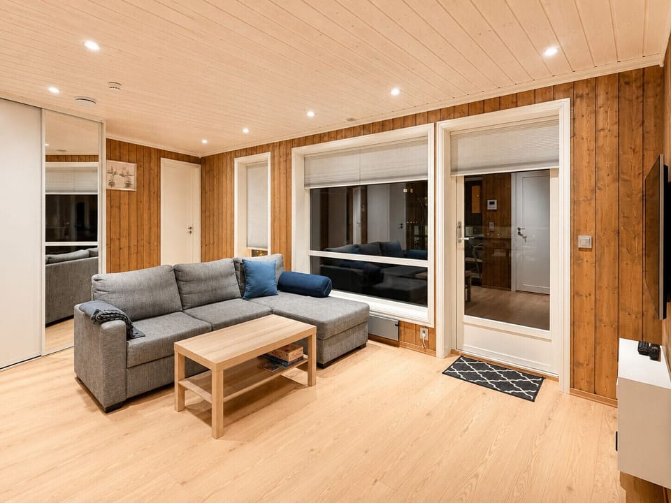Spacious living room with access to the outdoor terrace