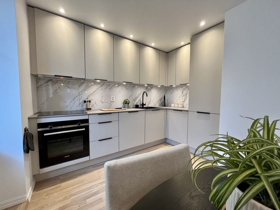 Modern kitchen with all appliances.