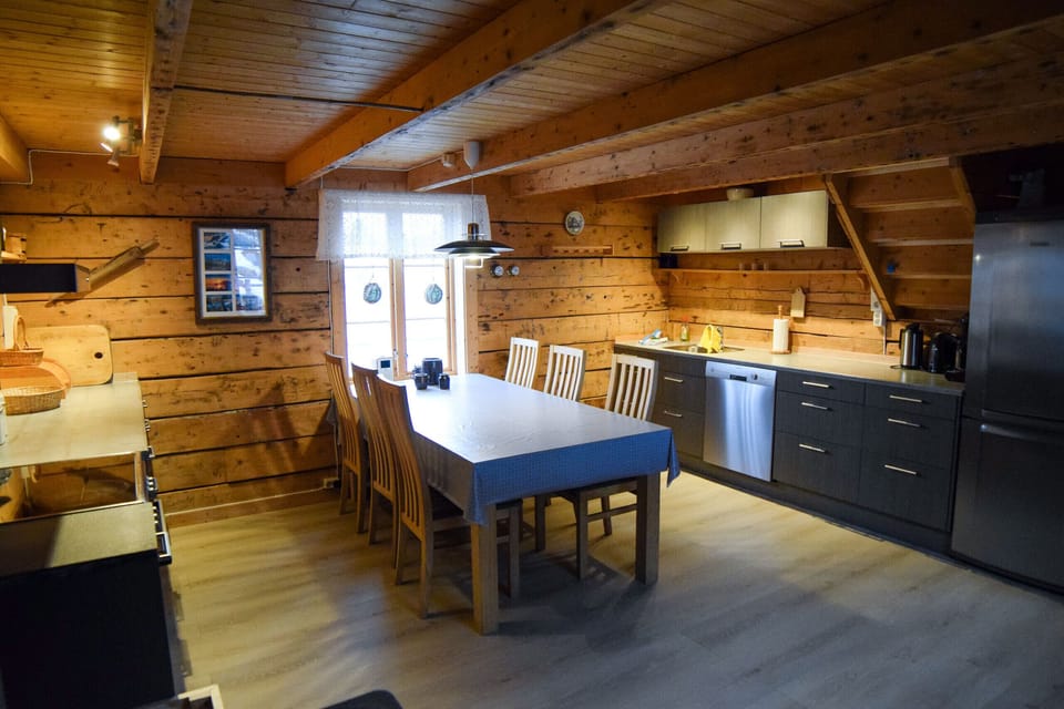 The kitchen is modern and spacious