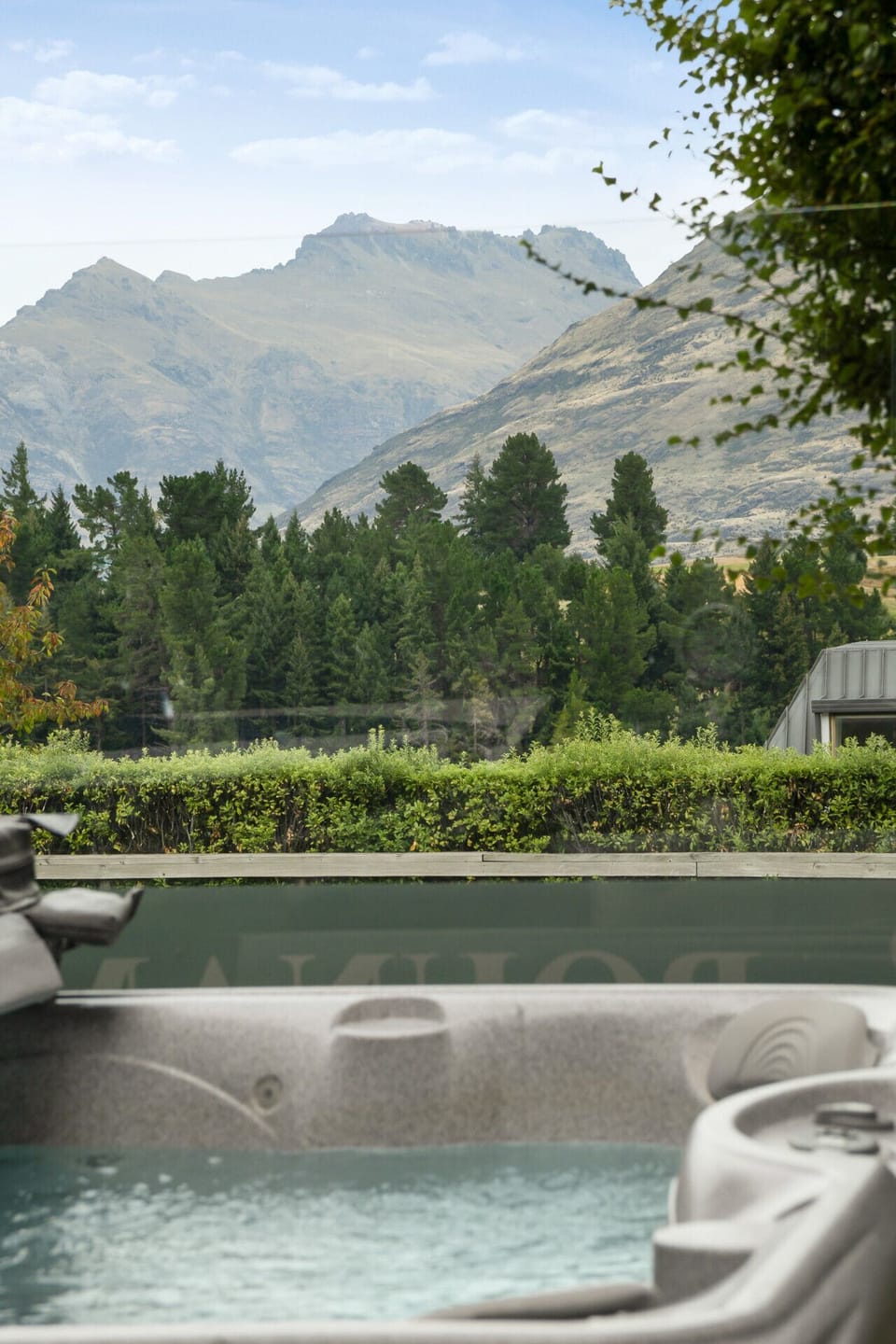 The hot tub is shared with complex guests and bookable through the Swissbel reception on-site
