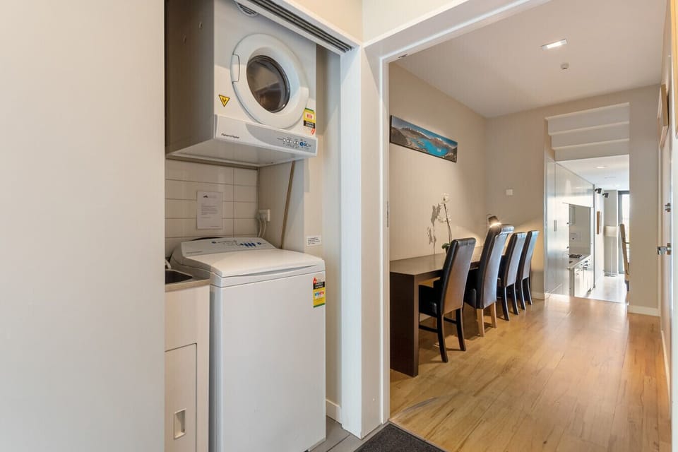 Entryway (where the dryer & Washing Machine are located) and the hallway (where the office space is located)