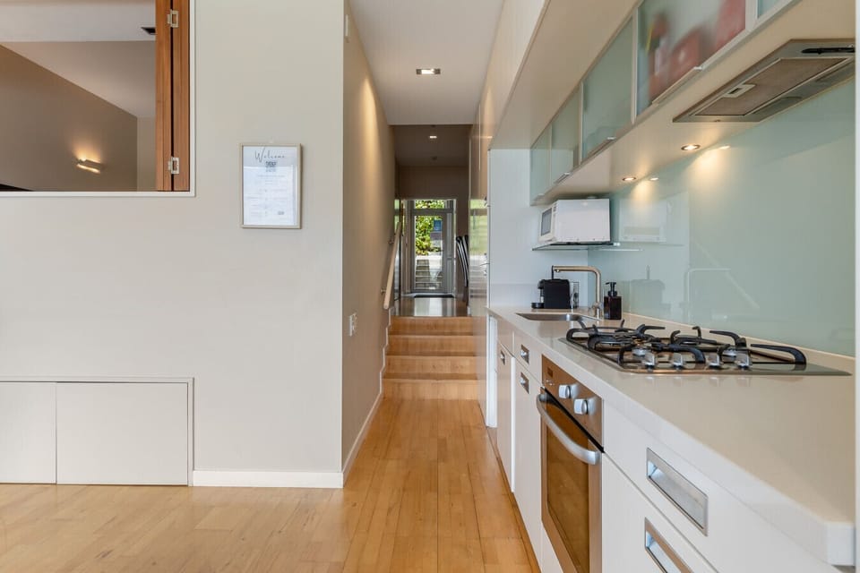 Fully equipped kitchen overlooking Lake Wakatipu and the mountains