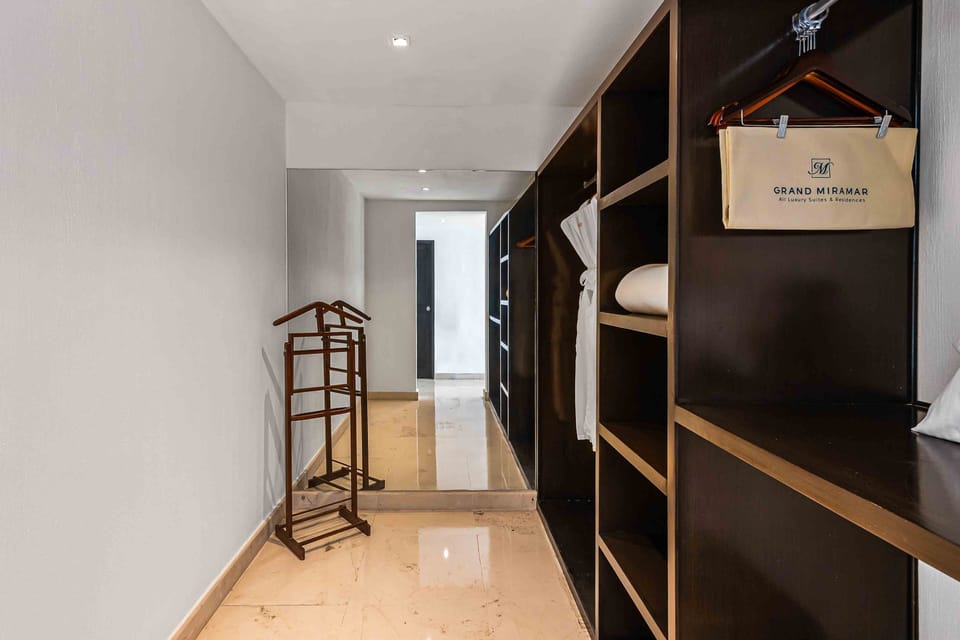 Relaxing bedroom with sliding doors leading to a private terrace and ocean views