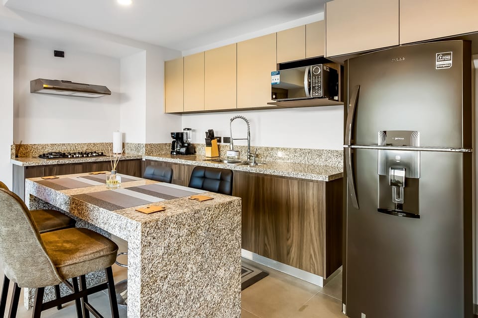 Seamless dining and kitchen layout for comfort and style.
