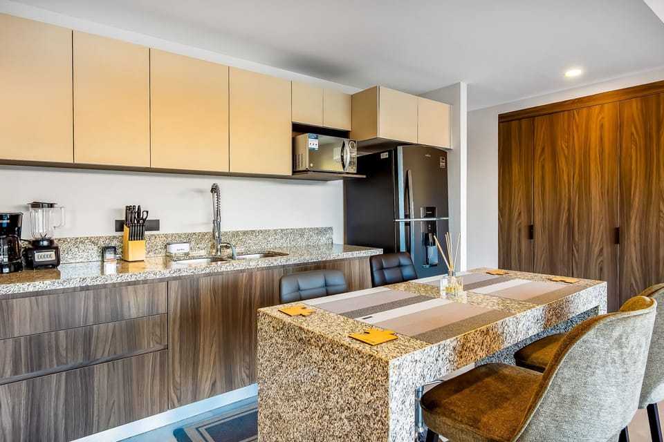 Seamless dining and kitchen layout for comfort and style.