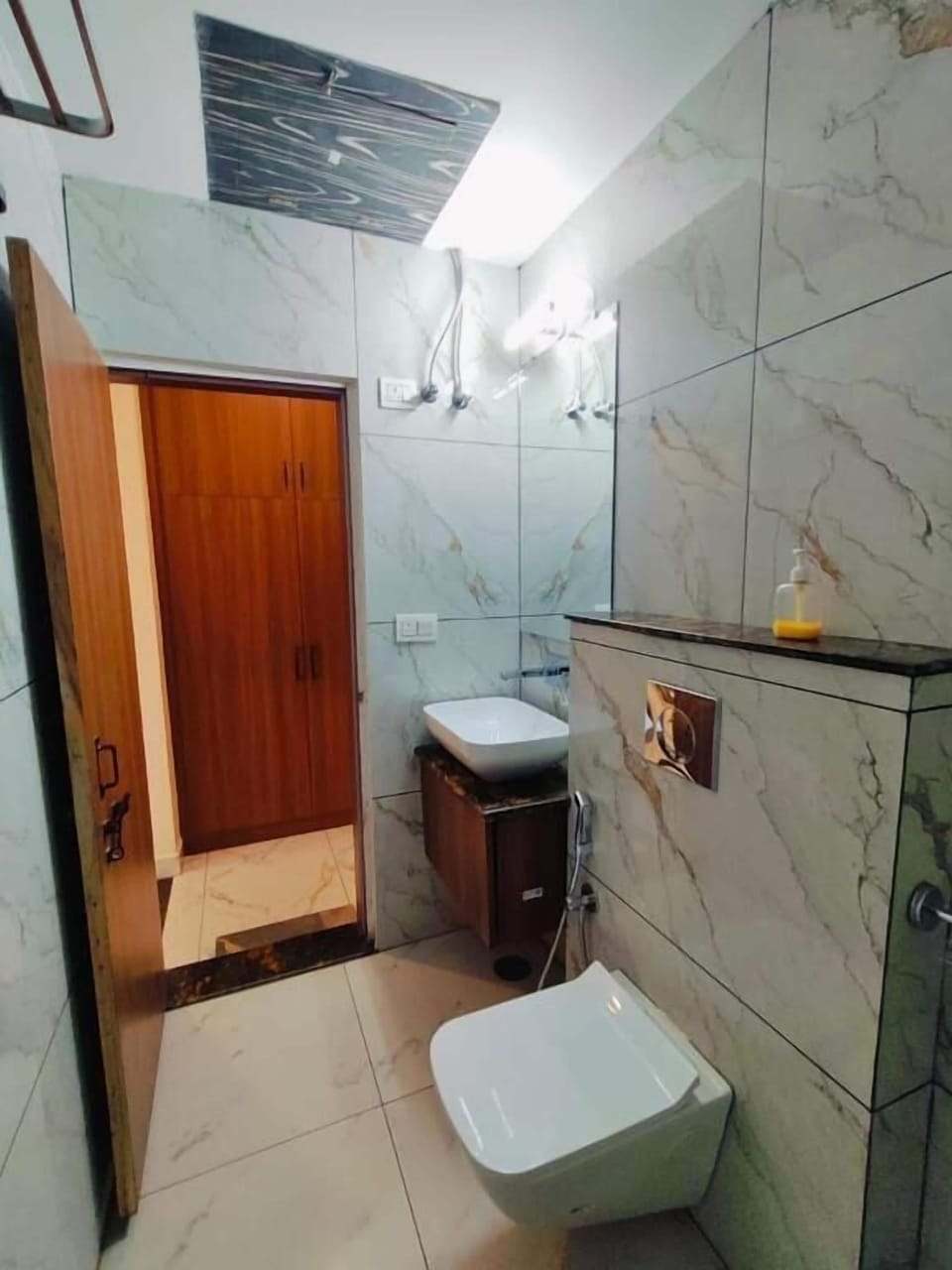 Shower, free toiletries, slippers, soap