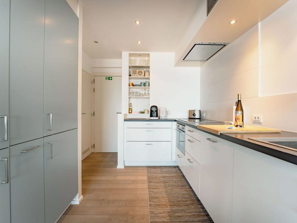 Kitchen, Countertop, Kitchen Appliance, Interior Design, Cabinetry, Flooring, Furniture, Floor, Major Appliance, Wood