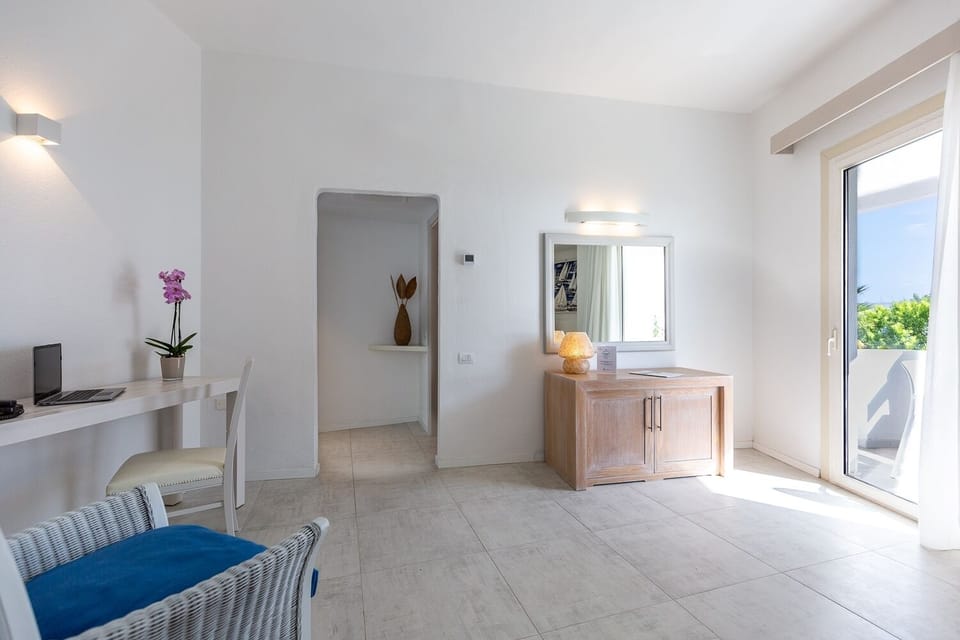 Suite, Sea View | Living area | TV