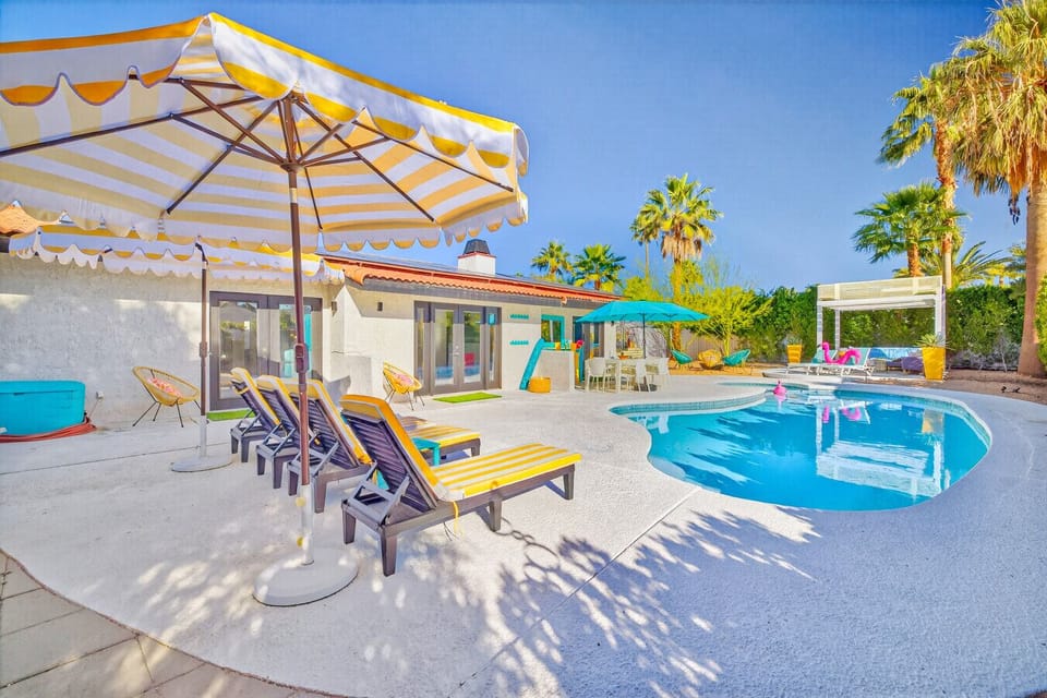 Dive into relaxation! Private pool and lush landscaping make this Palm Springs rental perfect for sunny getaways