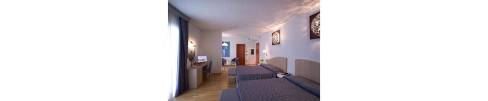 Suite, 2 Queen Beds | Minibar, in-room safe, desk, laptop workspace