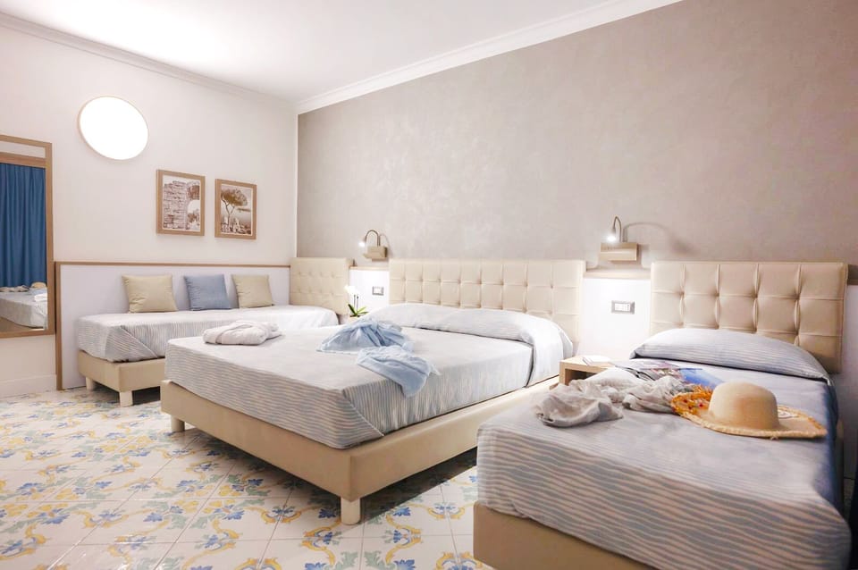 Comfort Triple Room | In-room safe, desk, cribs (surcharge), WiFi (free)