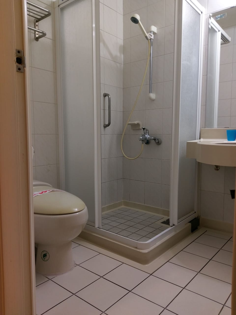 Shower, free toiletries, hair dryer, slippers