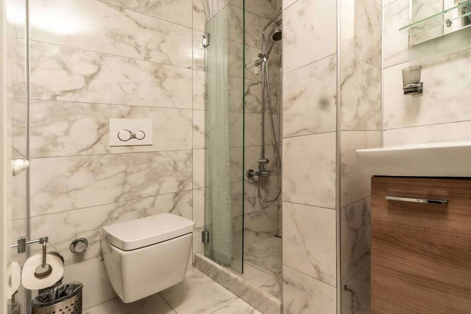 Exclusive Double Room, City View | Bathroom | Shower, hair dryer, towels, soap