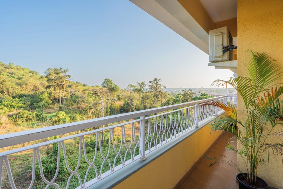 Deluxe Apartment, Balcony, Garden View | Property grounds