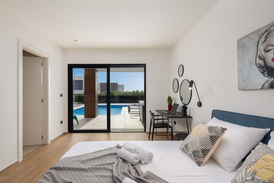 Bedroom with pool view