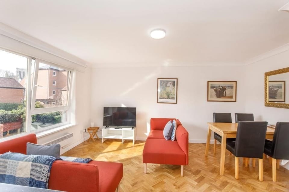 Apartment, City View | Living area | Flat-screen TV