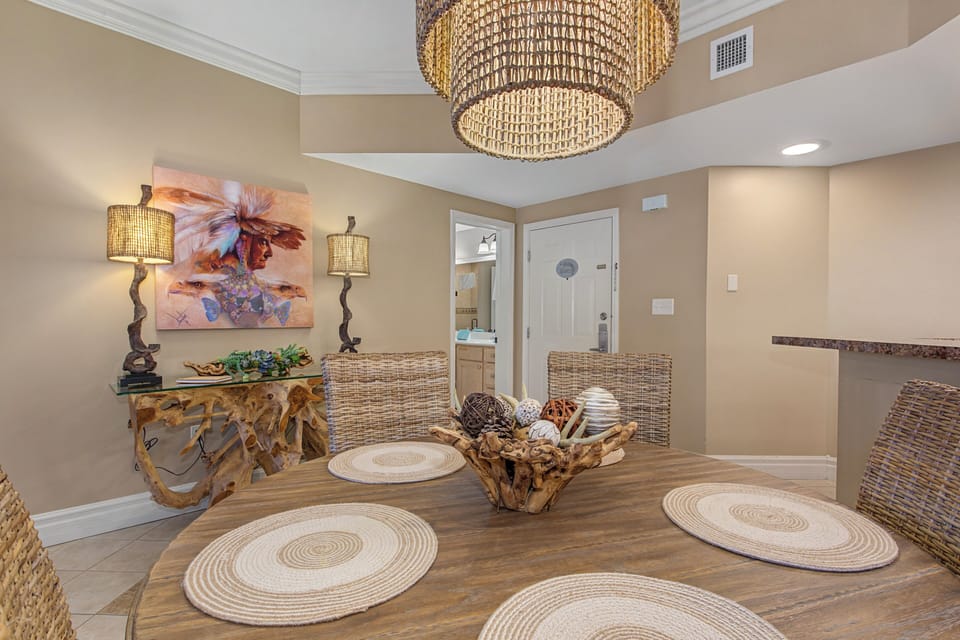 Your elegant dining space features handcrafted furniture and warm coastal touches, perfect for memorable meals together.