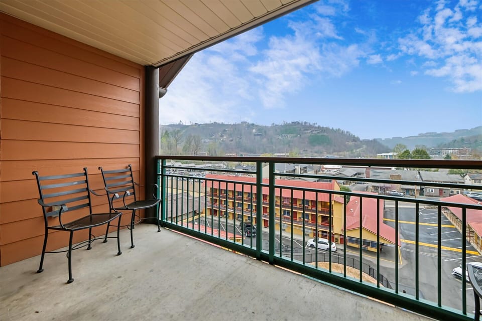 Step onto your private balcony and soak in stunning mountain views while sipping morning coffee in comfortable seating.