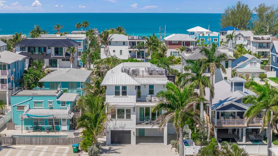 Front Elevation - Gulf Views - Short walk to the beach!