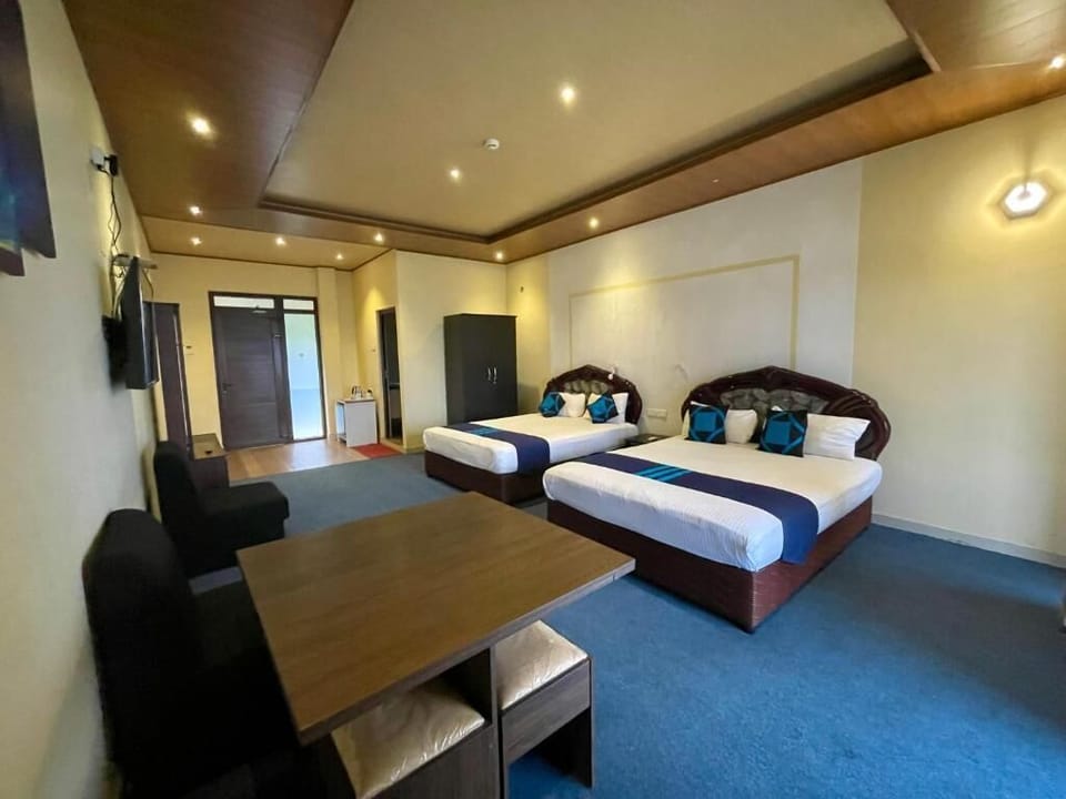Family Quadruple Room, Balcony, Mountain View | Desk, laptop workspace, free WiFi