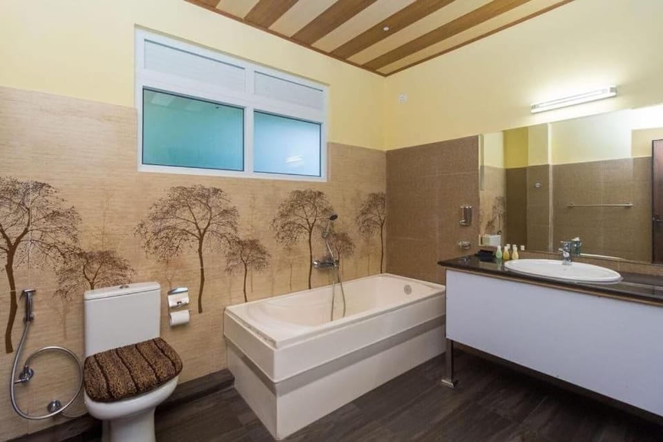 Separate tub and shower, towels, soap, shampoo
