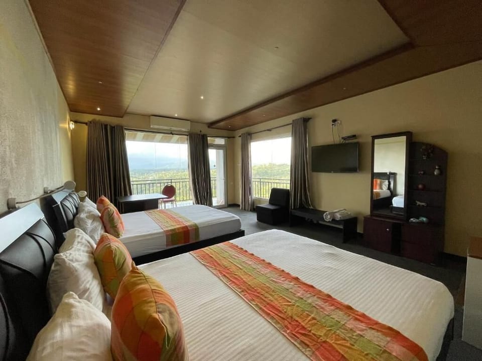 Family Quadruple Room, Balcony, Mountain View | Desk, laptop workspace, free WiFi
