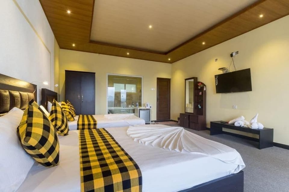 Family Quadruple Room, Balcony, Mountain View | Desk, laptop workspace, free WiFi