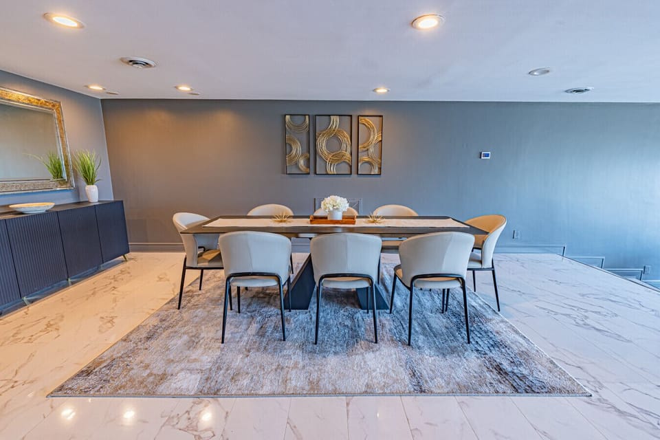 Spacious dining area ideal for shared meals, game nights, or gathering with family and friends.