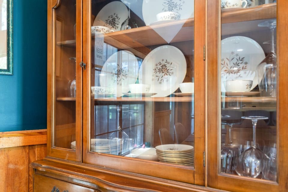 Dining Detail | Glass Front Cabinet | Curated Dishware Display