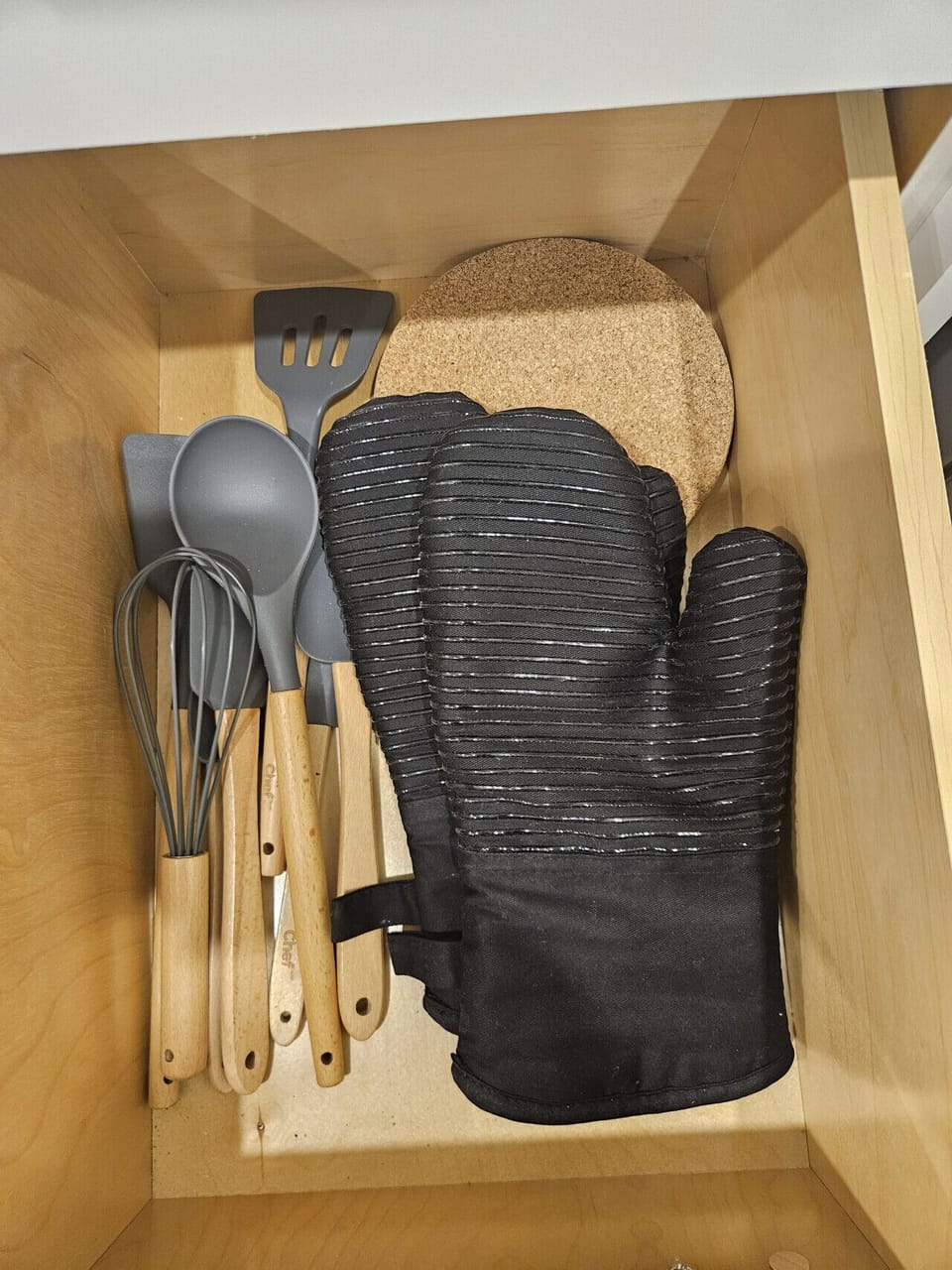 Enjoy the convenience of a truly move-in-ready kitchen, fully stocked with everything from wine openers to culinary essentials, ensuring you have all the tools needed for a seamless home-cooked meal