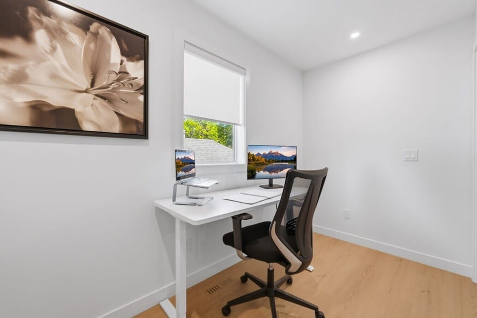 Quiet workstation area with a reliable monitor for those who need to check in on business.