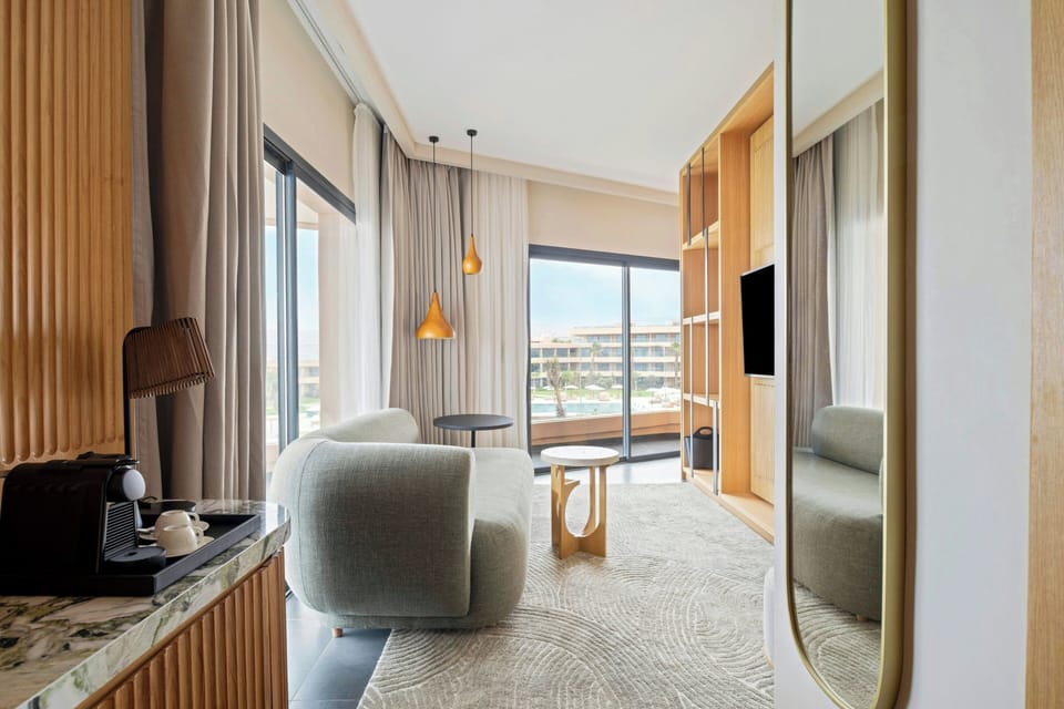 Junior Suite, 1 Bedroom, Balcony, Sea View | Living area | 55-inch Smart TV with satellite channels