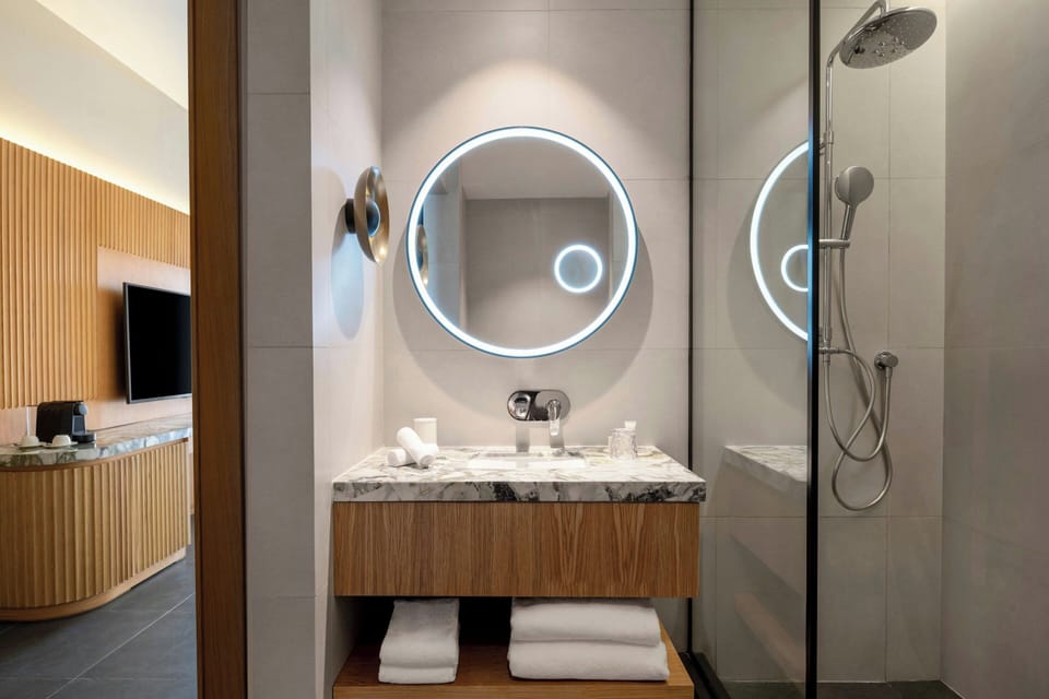 Hair dryer, slippers, towels, shampoo