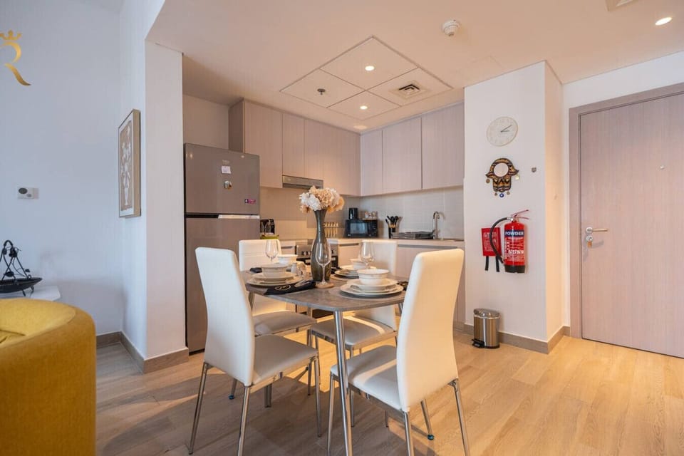 Dining table comfortably seats 4 guests.