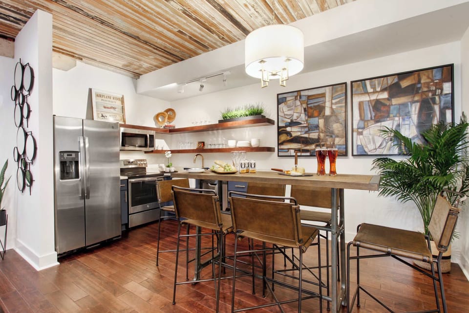 Unit 203 | Open Concept Chef's Kitchen | Fully Equipped | Open to Dining | Second Floor
