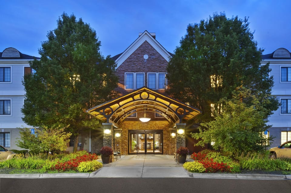 Glass-fronted entrance leads to the 24-hour front desk — reception is always staffed
