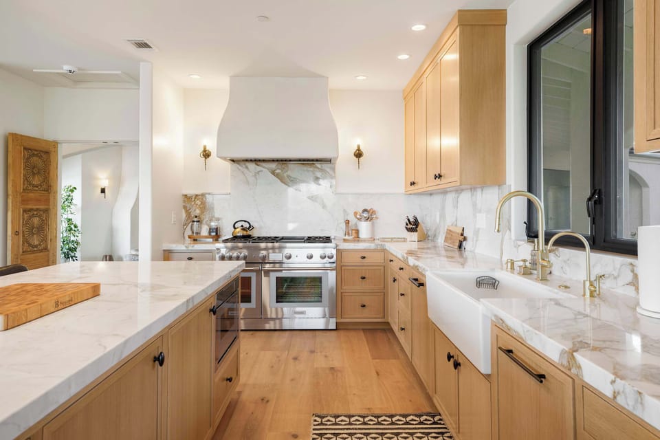 Sleek quartz countertops and top of the line appliances