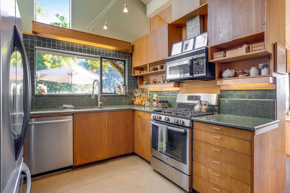 Craft culinary delights in this well-equipped kitchen, where ample counter space and modern appliances inspire your inner chef.