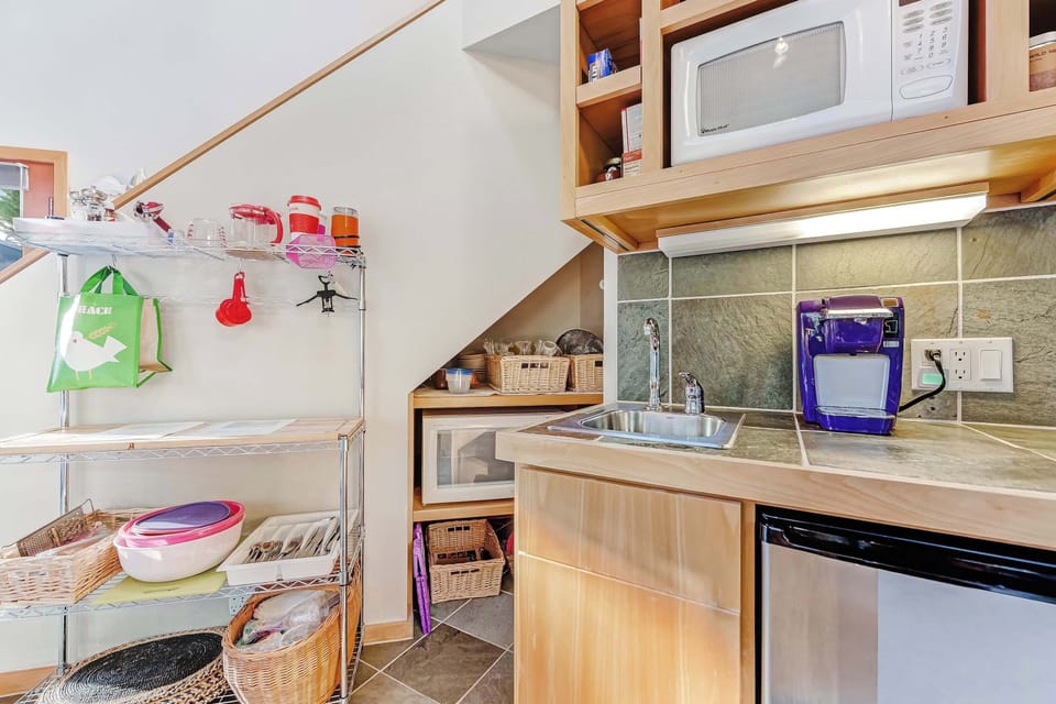 Your kitchen is equipped with a hot plate for cooking. 
