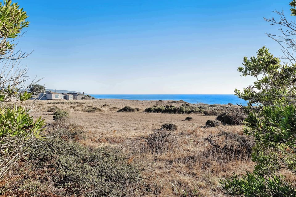 Gaze across the expansive landscape from this vantage point, where the beauty of the Sea Ranch coast unfolds before you.