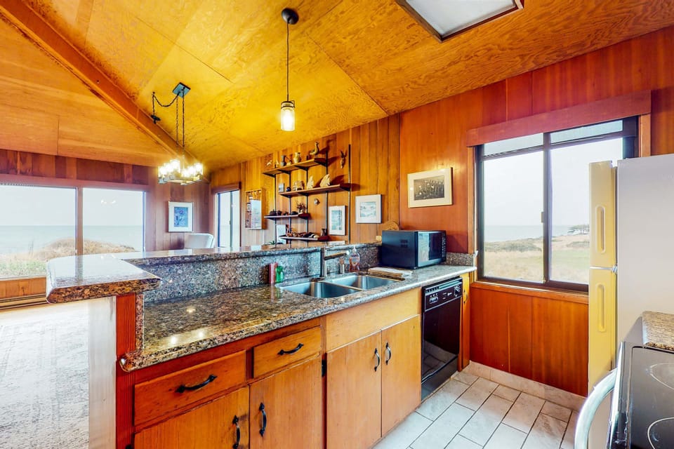 With a layout that promotes connection, this kitchen allows you to cook while staying engaged with family and friends in the adjacent living space.