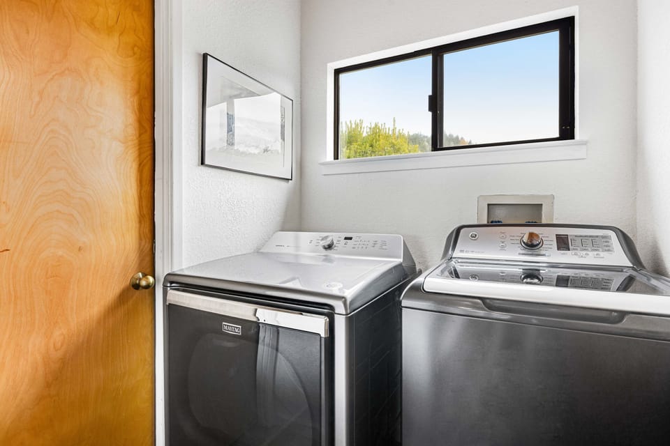 Enjoy the convenience of an in-home laundry, making it easy to keep your beachwear fresh for every adventure.