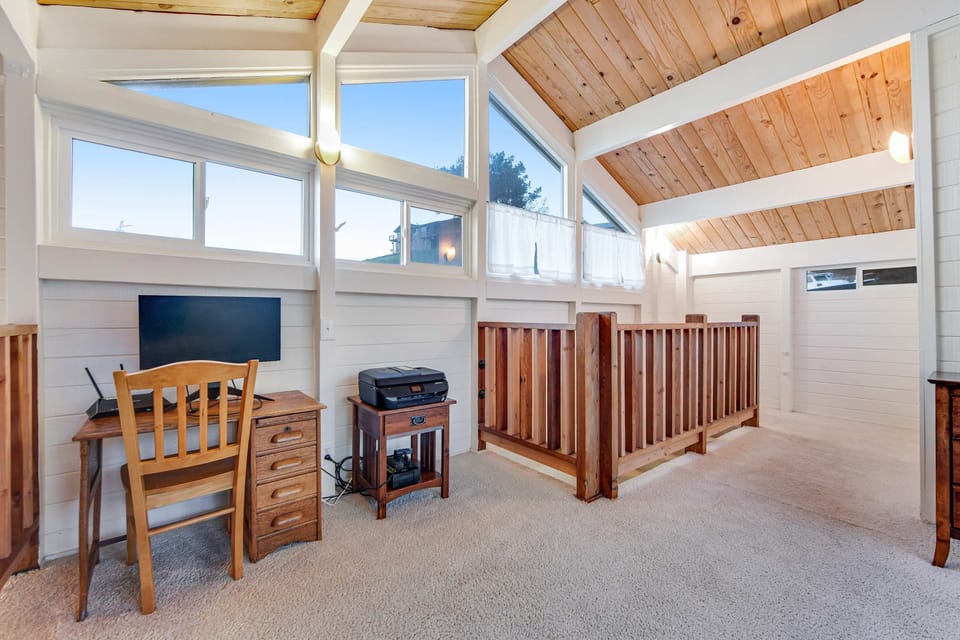 This cozy nook is perfect for catching up on work or planning your next adventure, all while surrounded by the beauty of coastal living.